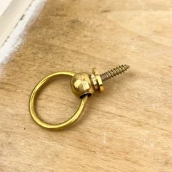 Bouton anneau en laiton poli