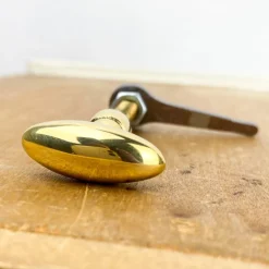 Bouton clavette olive en laiton poli