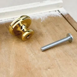 Bouton cuvette molette en laiton poli