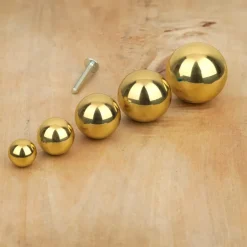 Bouton de meuble boule laiton poli