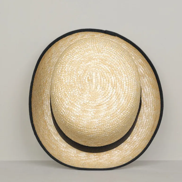 Chapeau melon en paille tressée