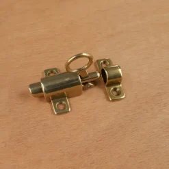 Cliquet de suréclairage en laiton sans tige