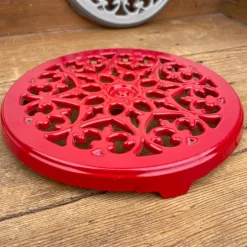 Dessous de plat en fonte rouge
