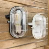 Lampe hublot en bakélite pour salle de bain