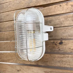 Lampe hublot en bakélite pour salle de bain