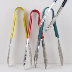 Pince en inox avec manche de couleur