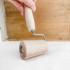 Rouleau conique à étaler la pâte