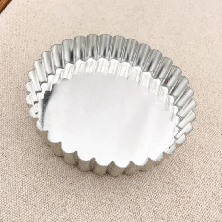 Tartelette en fer blanc à fond mobile