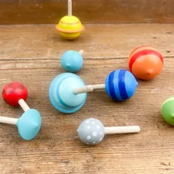Toupies planète en bois