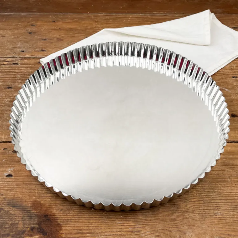 Tourtière en fer blanc