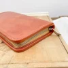 Trousse en cuir naturel