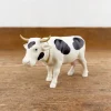 Vache qui hoche la tête