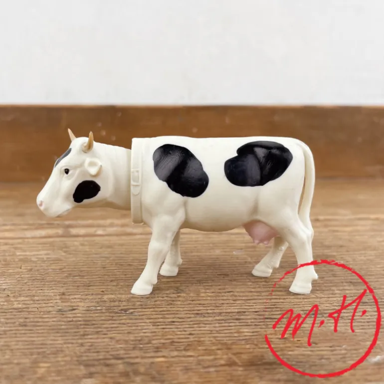 Vache qui hoche la tête